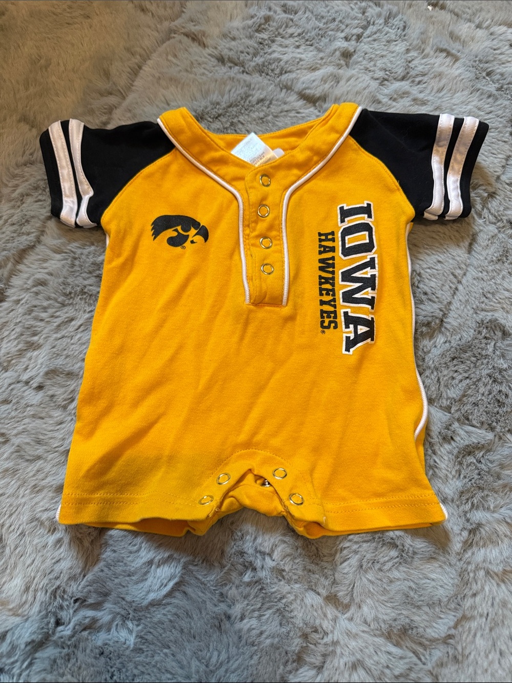 NCAA Iowa Hawkeyes Yellow and Black Infant One-Piece Romper.